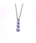 9ct White Gold Tanzanite & Diamond Fancy Swirl Pendant